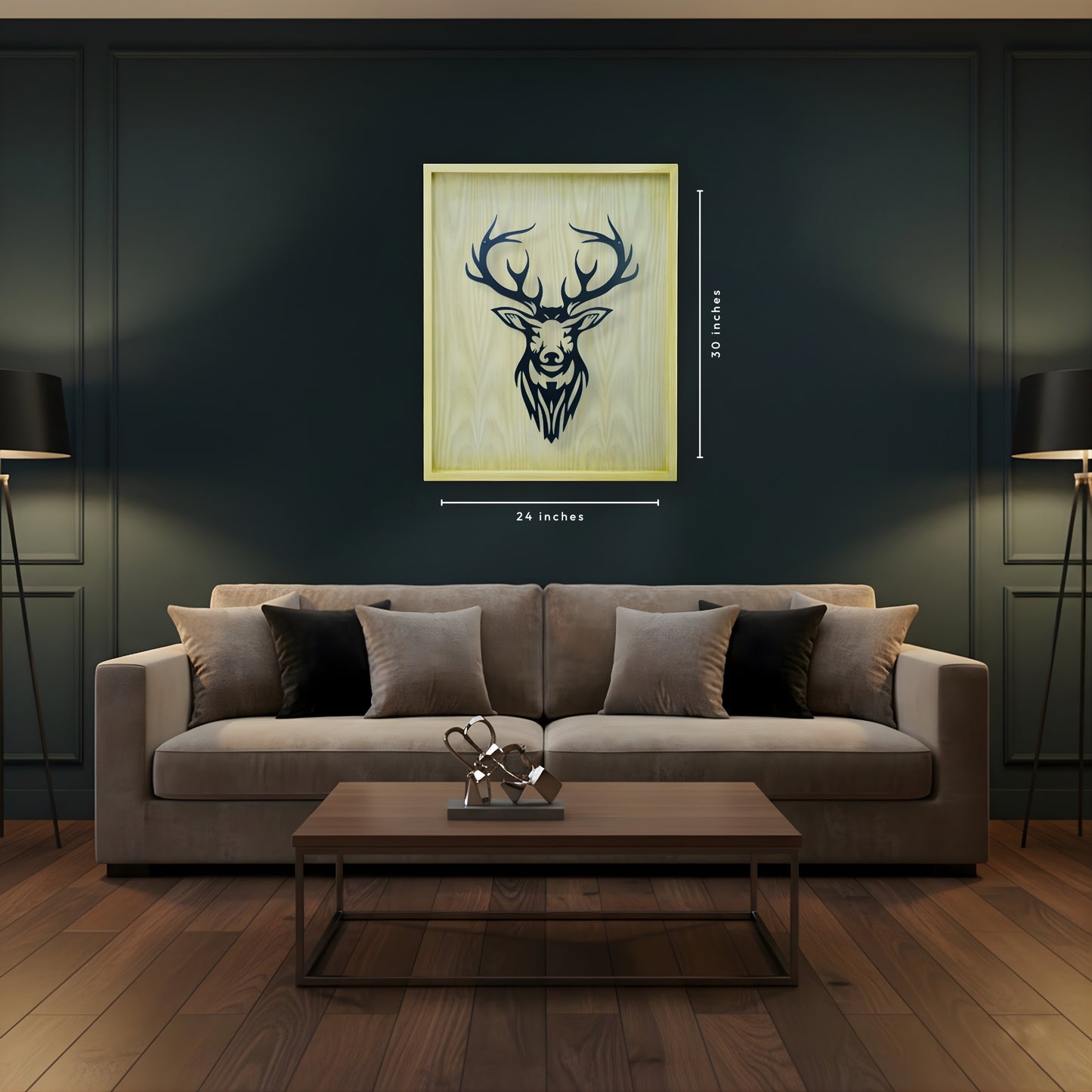Living room with a gray sofa, wooden coffee table, and deer head artwork on the wall.