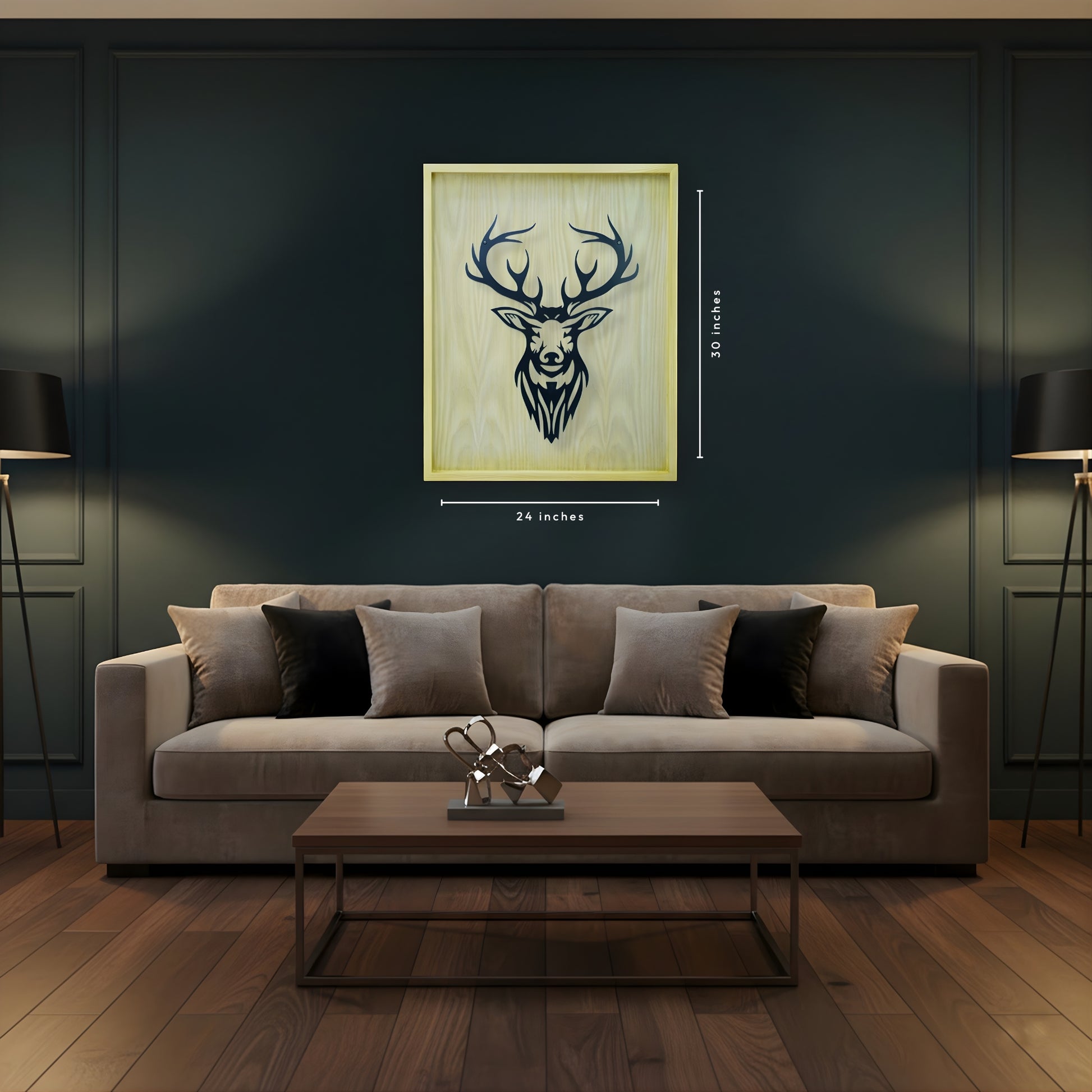 Living room with a gray sofa, wooden coffee table, and deer head artwork on the wall.