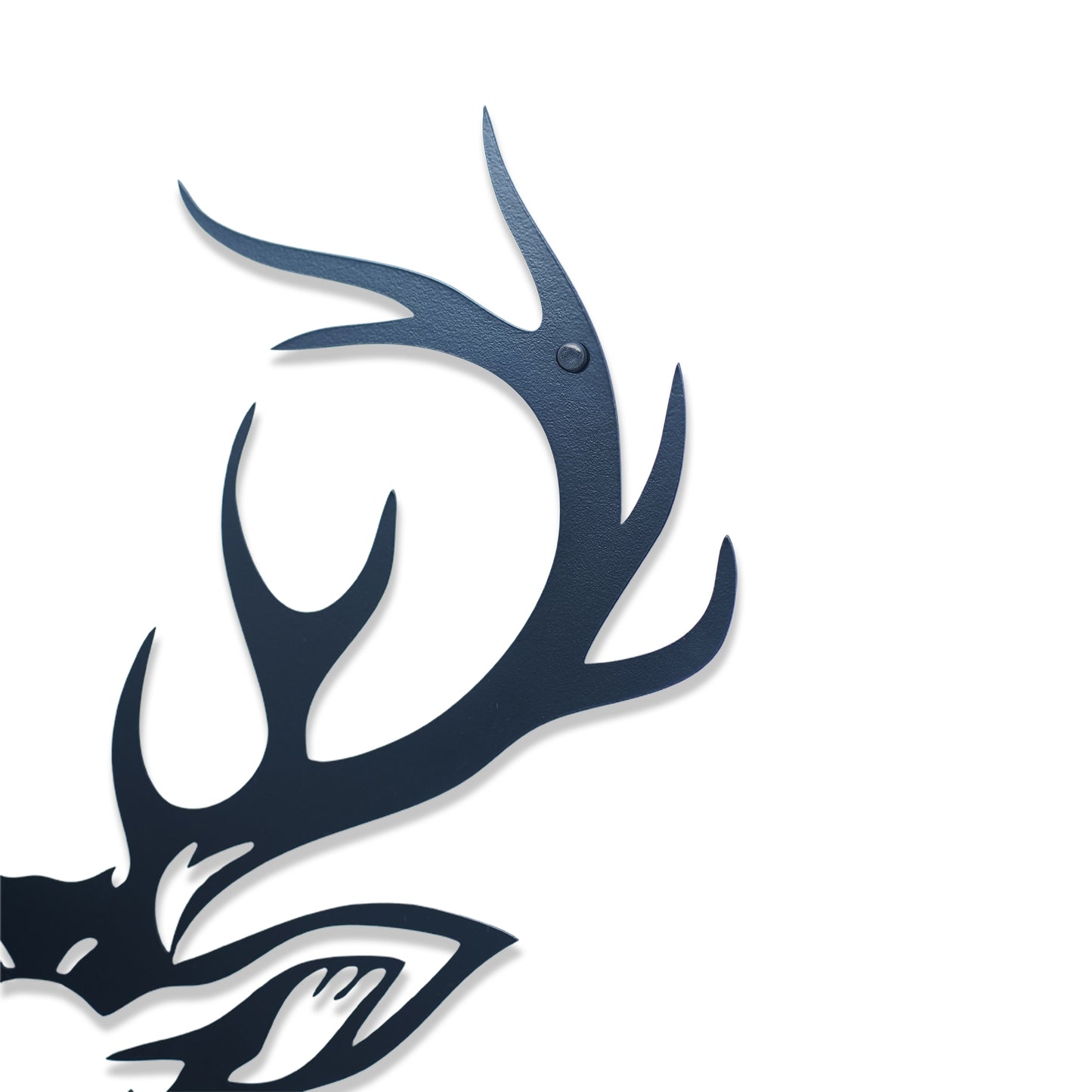 Metal wall art with deer antlers on a white background