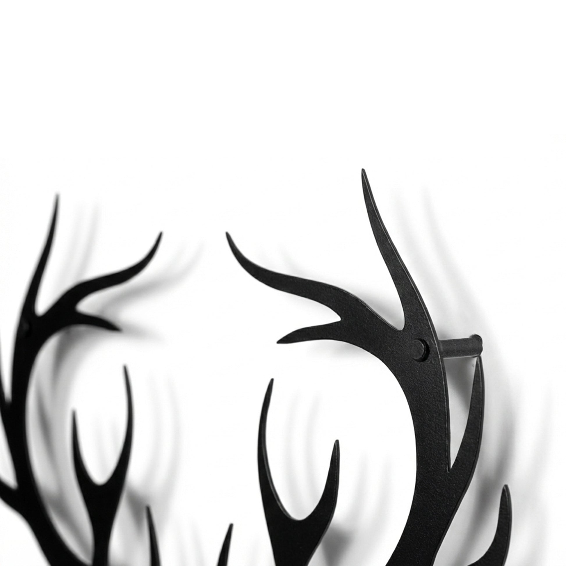 Black antler design on a white background