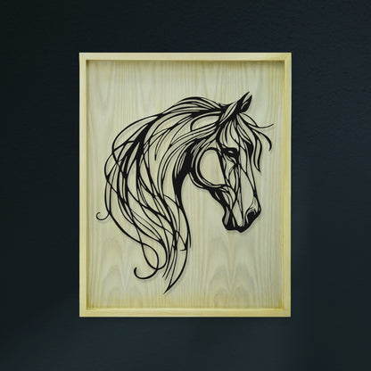 Framed artwork of a horse's head on a wooden background