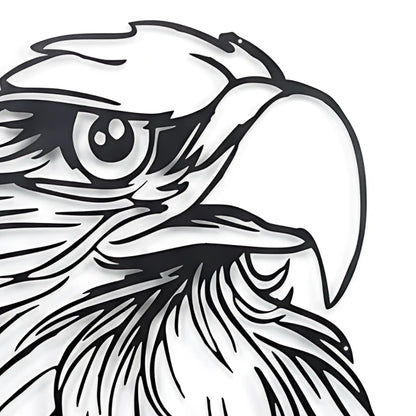 close up shot of Black metal art CNC laser cut of an eagle's head on a white wall.