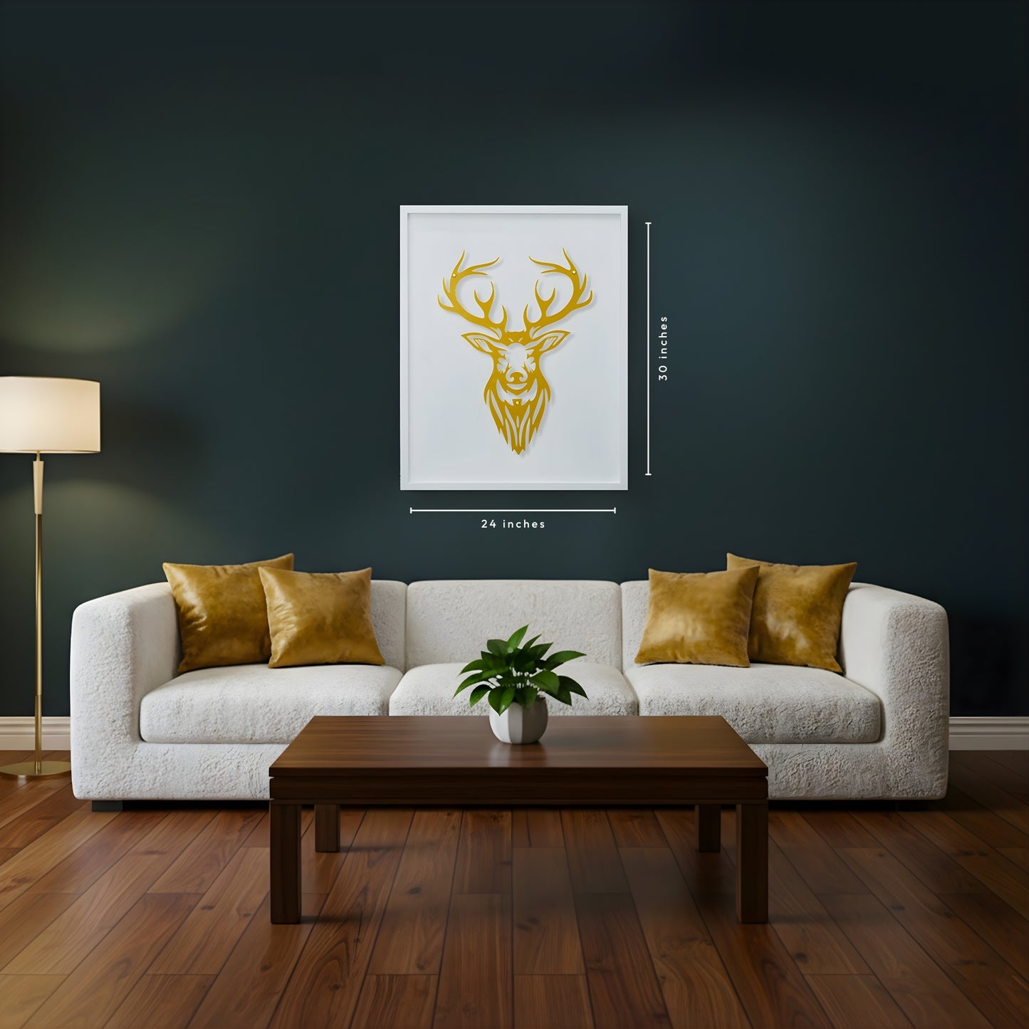 Living room with a white sofa, wooden coffee table, and deer head artwork on white wooden frame on the wall.