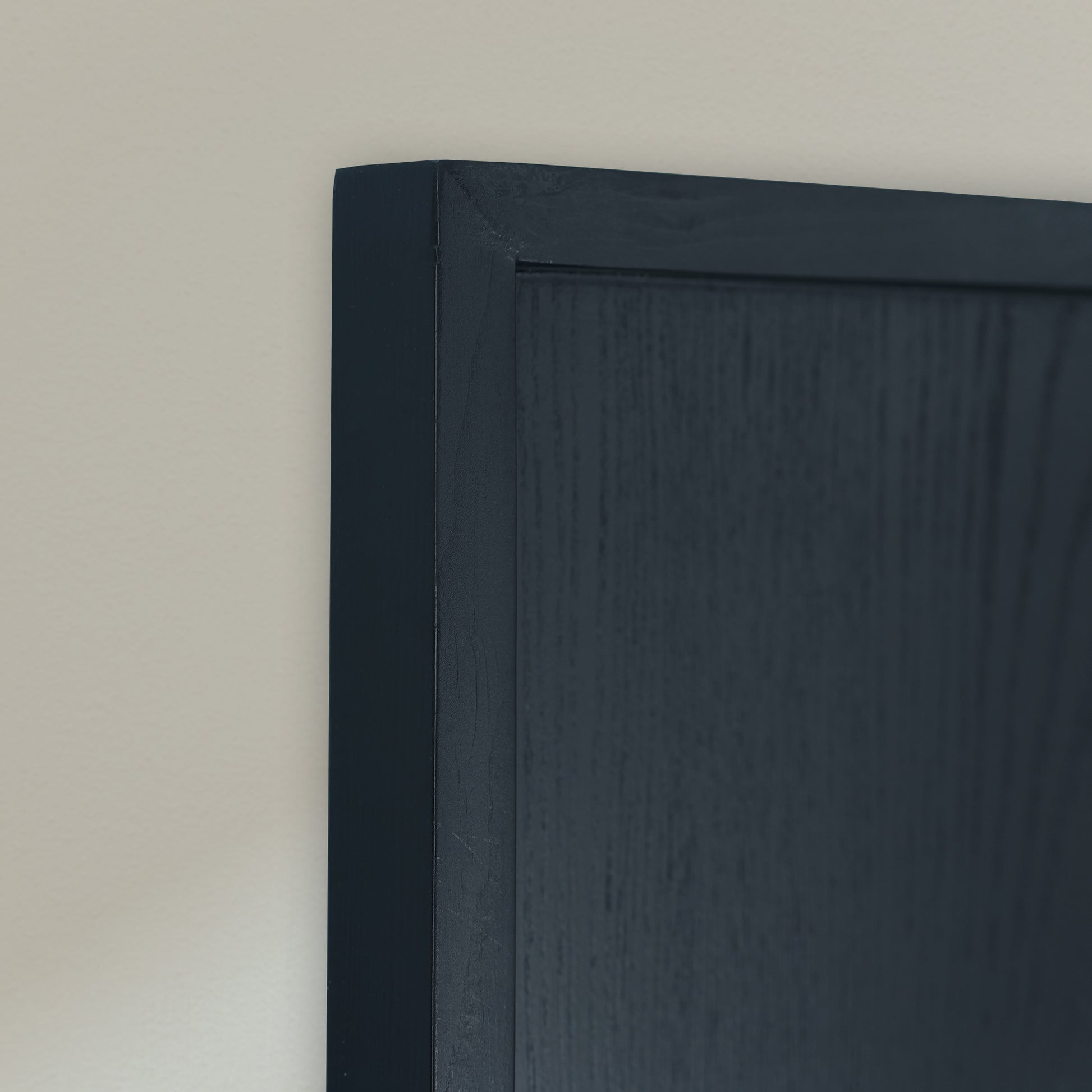 Black wooden frame edge close up background