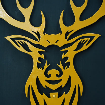 Gold deer head silhouette on a black background