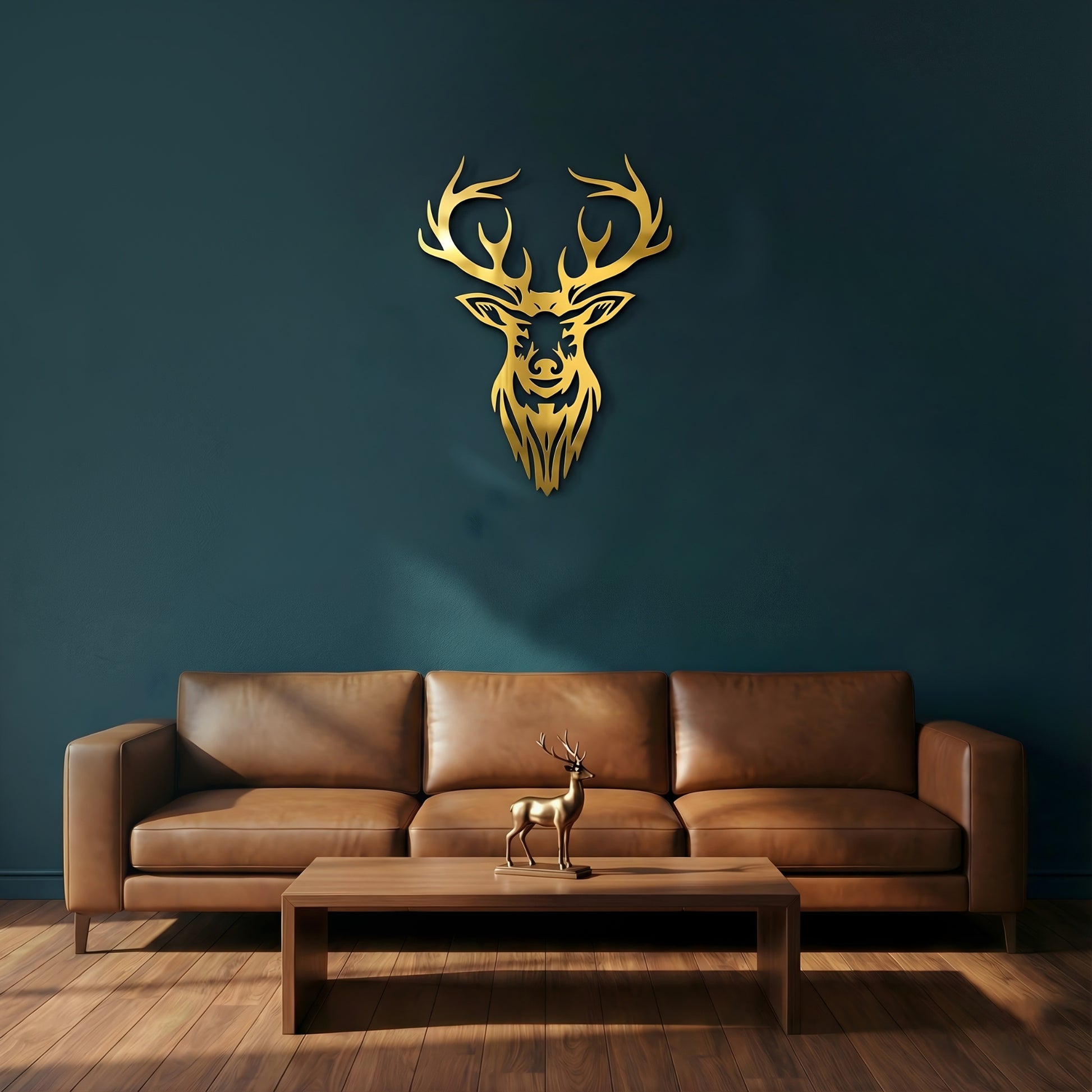 Gold deer head wall art above a brown leather sofa in a living room setting.