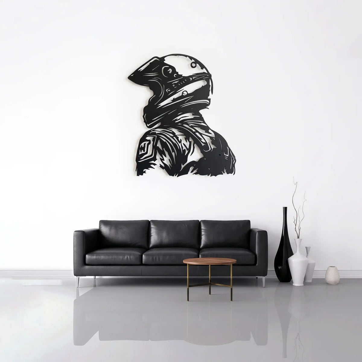 Black CNC laser-cut Racing Rider Metal Wall Art displayed on white wall above leather sofa in minimalist living room