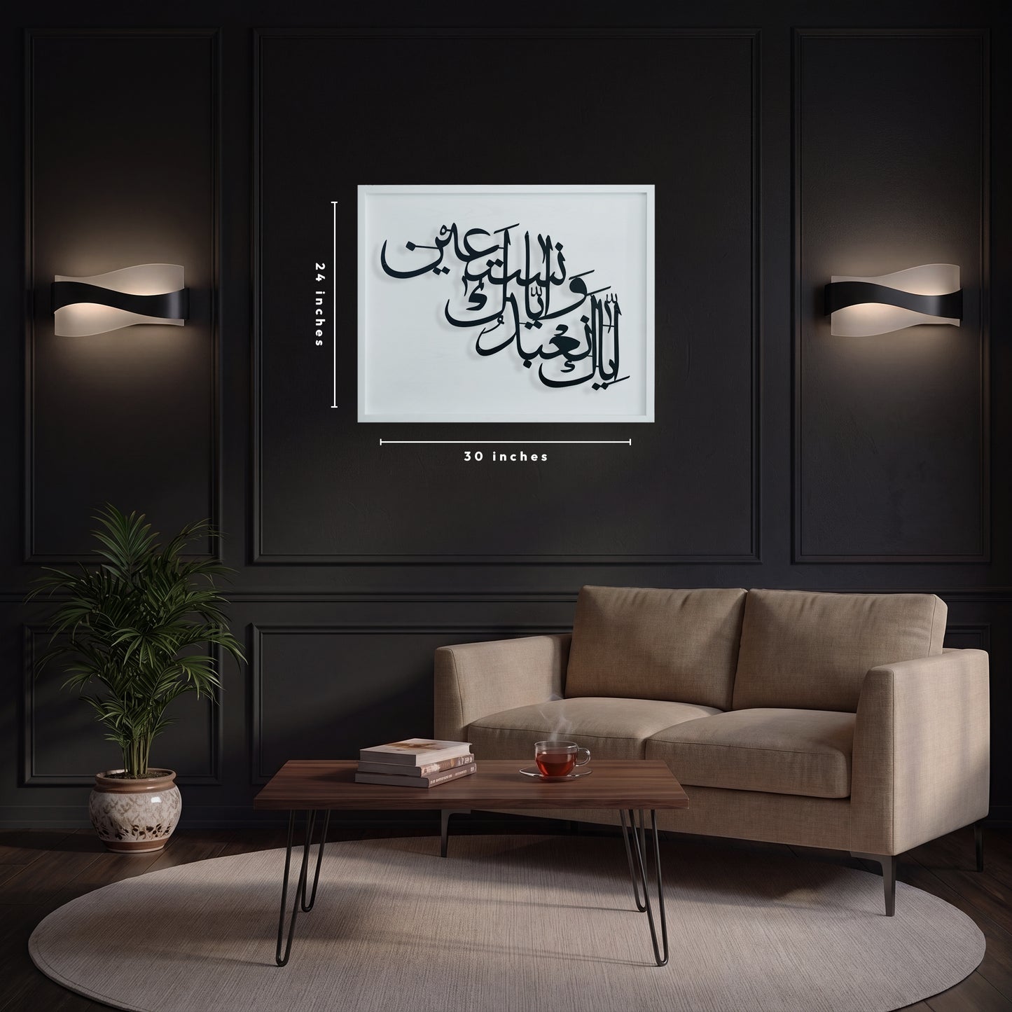 A framed black Arabic calligraphy metal wall art on white wooden frame is displayed on a dark paneled wall above a beige sofa in a modern living room. White dimension lines indicate the print is 30 inches wide by 24 inches high.